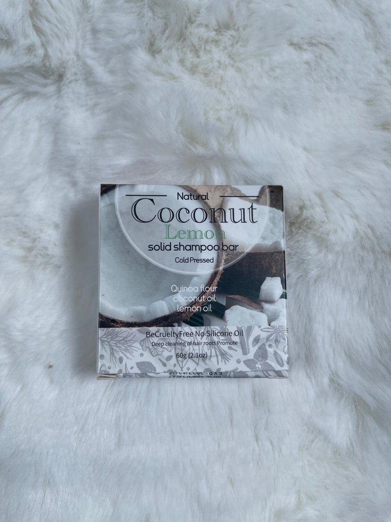 Coconut Lemon solid shampoo bar box on a white fur background